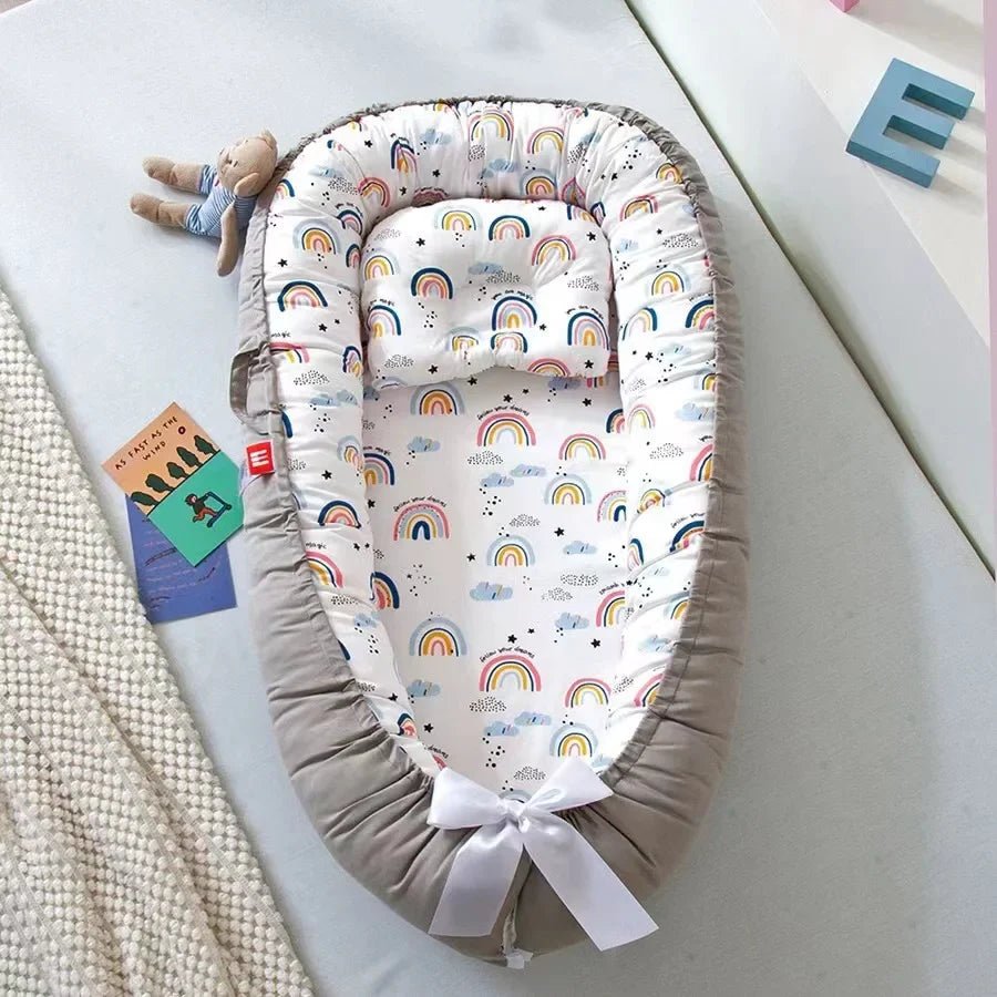 Berceau bébé apaisant nidportablebébé arc en ciel