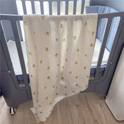 Couverture bebe douce légère sur berceau Plume Bio