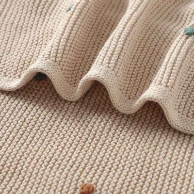Couverture bébé tricotée douce amande zoom Nid Tricoté