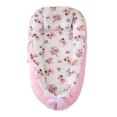 Réducteur de lit bébé cocon rassurant NidPortableBébé Rose