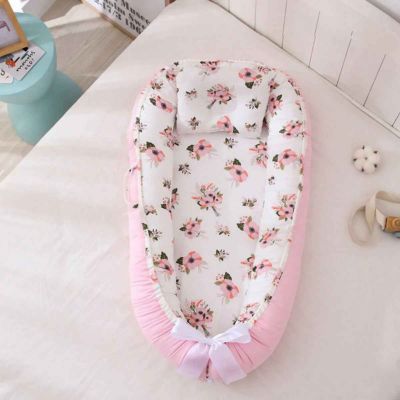 Réducteur de lit bébé doux rassurant NidPortableBébé Rose