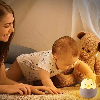Veilleuse bébé lumière douce magique Lueur de Poussin